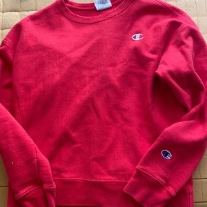 A barley worn Champion crewneck sweatshirt.